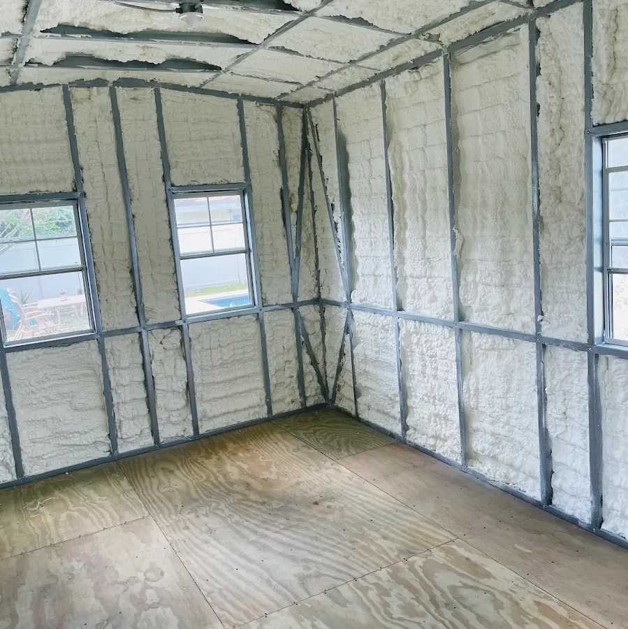 Closed-cell spray foam insulation applied to wall cavities in a residential project in Port Sheldon